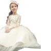 2019 Abiti da ragazza in fiore da sposa in pizzo gioiello a maniche lunghe e tulle Abiti da cerimonia per bambini con bottoni a fascia