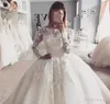 El más nuevo vestido de novia de princesa Vintage árabe de Dubái, vestido de novia de tul con apliques de encaje de manga larga transparente hinchado, vestido de novia hecho a medida