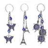 Lucky Butterfly och Ond Rolig Eye Lycka till Keychain Ring Handväska Charm Crystal Eiffeltorn Hängande Purse Väska Keyring Gift