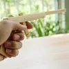 Livraison gratuite Puzzle modèle enfant Pistolet jouet Pistolet jouet en bambou Artisanat folklorique Pistolet jouet pour enfants souvenirs d'enfance 24cm * 12cm