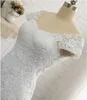 Abito da sposa a sirena in pizzo bianco senza schienale 2019 Abito da sposa abito da sposa a maniche corte