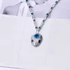 Vente chaude Fashion Lady Femmes Brass 18k Incrust Color Colliers Gemstone avec un diamant complet rouge / Blue Eyes Zircon Head Pendant3252027