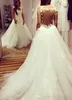 2019 fabulosas sobrefaldas vestido de novia Vintage árabe Sexy espalda apliques de encaje vestido de novia hecho a medida de talla grande