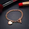 Geometric Braceletes 18K Rose Heart Gold Pendant O / T Buckle Elegante Jóias Romantic Designer Para Mulheres Raparigas Belas Amor pulseira Bijoux