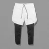Nouveau Style hommes pantalons sport athlétique doublure été Shorts Fitness Gym survêtement pantalon solide maigre avec poche