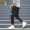 januarysnow 브랜드 디자이너 남자 패션 스포티 한 바지 힙합 인과 원인 Runnings 바지 높은 거리 조깅 바지 뉴 포켓 바지