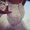 2020 Vestidos de novia de sirena de lujo Fuera del hombro Apliques de encaje Con cuentas Volantes escalonados Sin respaldo Tren de barrido Vestido de novia Vestidos de novia formales