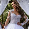 2019 Abiti da sposa eleganti in pizzo A Line Sheer maniche lunghe Tulle Applique in pizzo Sweep Train Abiti da sposa da sposa con bottoni