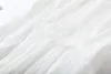 Una línea elegante blanco malla encaje capa Maxi vestidos mujeres verano cuello redondo sin mangas volantes plisados vestidos largos de fiesta