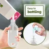 Bästa 30 ml/50 ml/60 ml reseplastplast KLAR KEYCHAIN ​​HAND SANITIZER -flaskor, påfyllningsbara tomma flaskor Portabla klämbehållare med Flip Cap