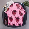 Harajuku Devil Ghost Monster estampado para hombre camisas de manga corta sueltas mujeres INS púrpura rosa Hip Hop camisetas Unisex Tops ropa de fiesta