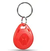 100ピースID RFID KEYFOB TK4100リモコン識別カードドアシステムエントリアクセスタグバッジトークンロック125kHz近接タグレッド