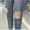 Vår Höst Ny Vintage Ripped Jeans för Mens Mode Casual Knee Längd Byxor Män Kläder Byxor Denim Hole Bottom DS50763