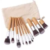 Kit di pennelli per trucco con manico in bambù da 11 pezzi Set di pennelli per cosmetici per fondotinta con imballaggio in sacchetto di stoffa