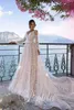 Sparkly Pentelei 2020 Abito da sposa a maniche lunghe Abiti da sposa Scollo a V Applicazioni di pizzo con perline Abiti da mari￩e