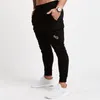 الرجال sweatpants 2019 عارضة رجل ركض السراويل الأزياء صالات اللياقة البدنية كمال الاجسام جيوب السراويل بوتيك الرجال الرياضية السراويل