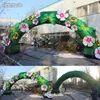 Böjd uppblåsbara blomsterbåge 10m Bredd Blow up Green Plants Archway med blommor för festhändelse och utomhus ingångsdörr dekoration