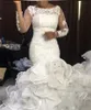 2019 New Cheap African Mermaid Wedding Dresses Scoop Neck Plus Size Lace Appliques Beaded Sequins Organza Tiered Skirts Formal Bridal Gowns