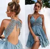 2019 verano mujer nuevo Sexy Halter Sling encaje patrón vestido sin mangas Correa caliente vestido de verano cuello en V profundo Delgado Vestidos elegantes