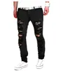 Hot Sale Men's Hole Jeans Europa och Amerika Mäns Tvätthål Katter Muste Denim Black Casual Byxor