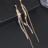Moda: orecchini lunghi con nappa con strass in metallo, orecchini pendenti con goccia di cristallo color oro, per gioielli bijoux da donna