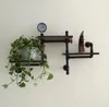 Antieke industriële waterpijp home decor zitkamer met planken bloem rack op de muur gemonteerde massief houten partitie boekenplank