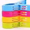 4pcs Plastic Plastic Color Clips пляжные полотенце зажим, чтобы предотвратить ветер.