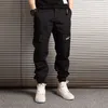 Мужские джинсы модной уличной одежды Мужчины свободные подходят много карманы грузовые брюки японские хип-хоп камуфляжные пробежки Brance1