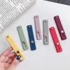 Simple bonbons couleur doigt télescopique portable Sangle support souple Support de téléphone silicone Wristband Support doigt Holder Anneau