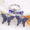 Butterfly chanceux et mauvais œil drôle Bonne chance Keychain Ring Handbag Charm Crystal Eiffel Tower Pendant Purse Sac Courterie Gift2857385