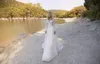 2019 Bohemian Beach Bröllopsklänningar V Neck Långärmad Lace Appliques Pärlor Brudklänningar En linje Boho Bröllopsklänning Robe de Marie