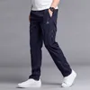 Vår sommar sportkläder byxor män polyester snabbtorkande byxor slitstarka ultra-ljus raka lösa sweatpants byxor