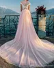 Czyste krótkie rękawy A-line sukienki ślubne Skromne koronki ślubne aplikacje Tiul Capel Train Long Vestidos de Soiree Beach Suknie 0430