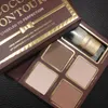 Toppkvalitet Pop COCOA Contour Kit 4 färger Bronzers Highlighters Powder Palette Nude Color Shimmer Choklad ögonskugga med borste