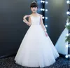 Uroczy biały / szampana Tulle Aplikacja Dziewczyna Korowody Suknie Kwiat Girl Sukienki Princess Party Dresses Child Spódnica Custom Made 2-14 H312214