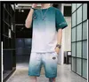 グラデーション夏の半袖メンズスーツファッションカジュアルエンターテイメントトラックスーツデザイナー男性ポケットTシャツパンツ2本の衣料品セット