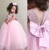 新しい素敵なピンクの花の女の子の服の結婚式半袖レースApplqieus Pearl Tule Long Girls PageantドレスProm Kids Comminision Gowns