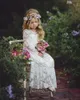 Langarm Boho Blumenmädchenkleider für Hochzeit bodenlangen Spitze kleine Kinder Erstkommunion Kleid Vintage günstige Mädchen Pa278s