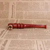 Lucidatura a mano del palo del tabacco in legno massello secco con bocchino per pipa a pera Huanghua ramo acido rosso utilizzando l'onda d'acqua