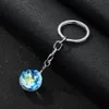 Ny Lysande Glöd i Dark Keychain Galaxy Universe Glass Ball Cabochon Nyckelringar Bilväska Key Rings Creative KeysRings Smycken Gift