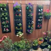 Nieuw Ontwerp Verticaal Opknoping Garden Planter Bloem Potten Lay-out Waterdichte Muur Opknoping Flowerpot Bag Perfecte oplossing