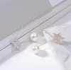 Moda: versión coreana de la personalidad de la nueva moda broche de diamantes de estrella de cinco puntas temperamento de otoño e invierno salvaje simple