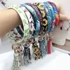 Leopard Läder Armband Keychain PU PU Wrist Round Tassel Pendant Party Armband Bangle Floral Keychain Ringar Kvinnor Tjej Händer Gratis