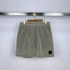 Pantaloni da spiaggia in nylon metallico Pantaloncini sportivi Capris pantaloni estivi moda uomo casual da corsa sciolti ad asciugatura rapida