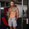 Erkekler Spor Salonları Fitness Şort Yaz Rahat Moda Serin kısa pantolon Erkek Jogger Vücut Geliştirme Egzersiz Adam crossfit Marka Eşofman Altı
