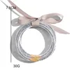 Braccialetti di gelatina alla moda Braccialetti glitterati per donne Ragazze Perline per tutte le stagioni Pieno di plastica Bowknot Nastro boemo Gioielli arcobaleno in silicone