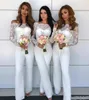 Sexy witte nieuwe jumpsuit bruidsmeisjes jurken voor bruiloften uit schouder zeemeermin lange mouwen kanten schede broek pakken bruidsmeisje jurken