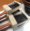 Släpp en toppkvalitet Aveda Paddelborste Brosse Club Massage Hairbrush Comb Förhindra Trichomadesis Hair Sac Massager7212783