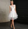 Krótkie Wielopoziomowe Suknie Ślubne O Neck Appliques A Line Bride Dress Princess Backless Lace Suknie Ślubne Vestidos de Novia 2020