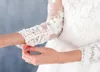 Abiti da sposa con applicazioni di pizzo floreale modesto 3D con maniche lunghe Collo gioiello Primavera Boho Abiti da sposa da giardino Sweep Train Spose formali Robes de Mariee AL3228